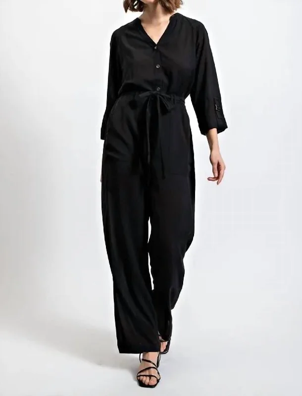 Wardrobe Essentials Roll Sleeve Waist Tie Jumpsuit In Black